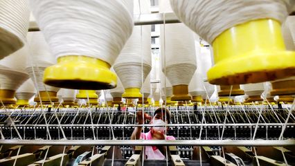 纺织企业开足马力促出产，针纺织品市场活力涌动